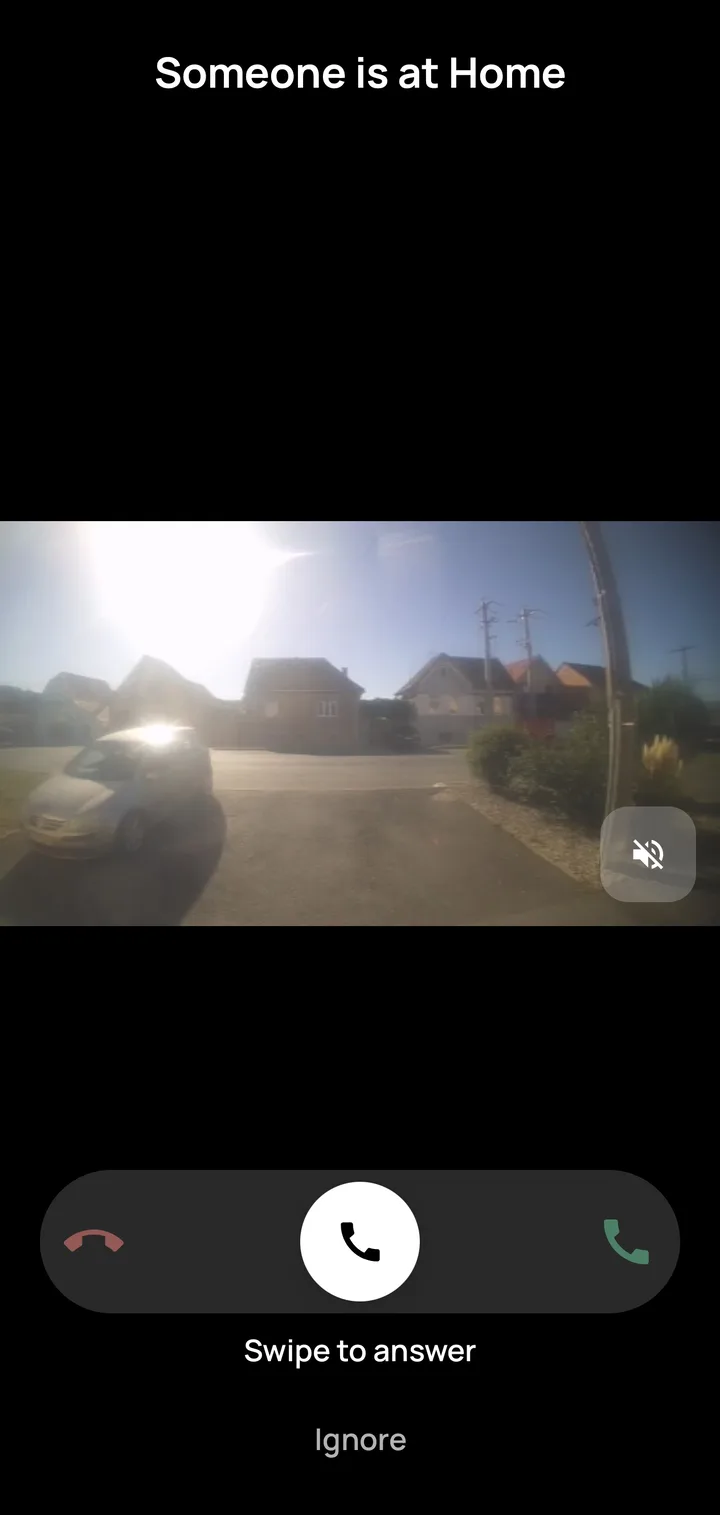 The ajar app ringing: the camera at the gate, with buttons to answer or dismiss.
